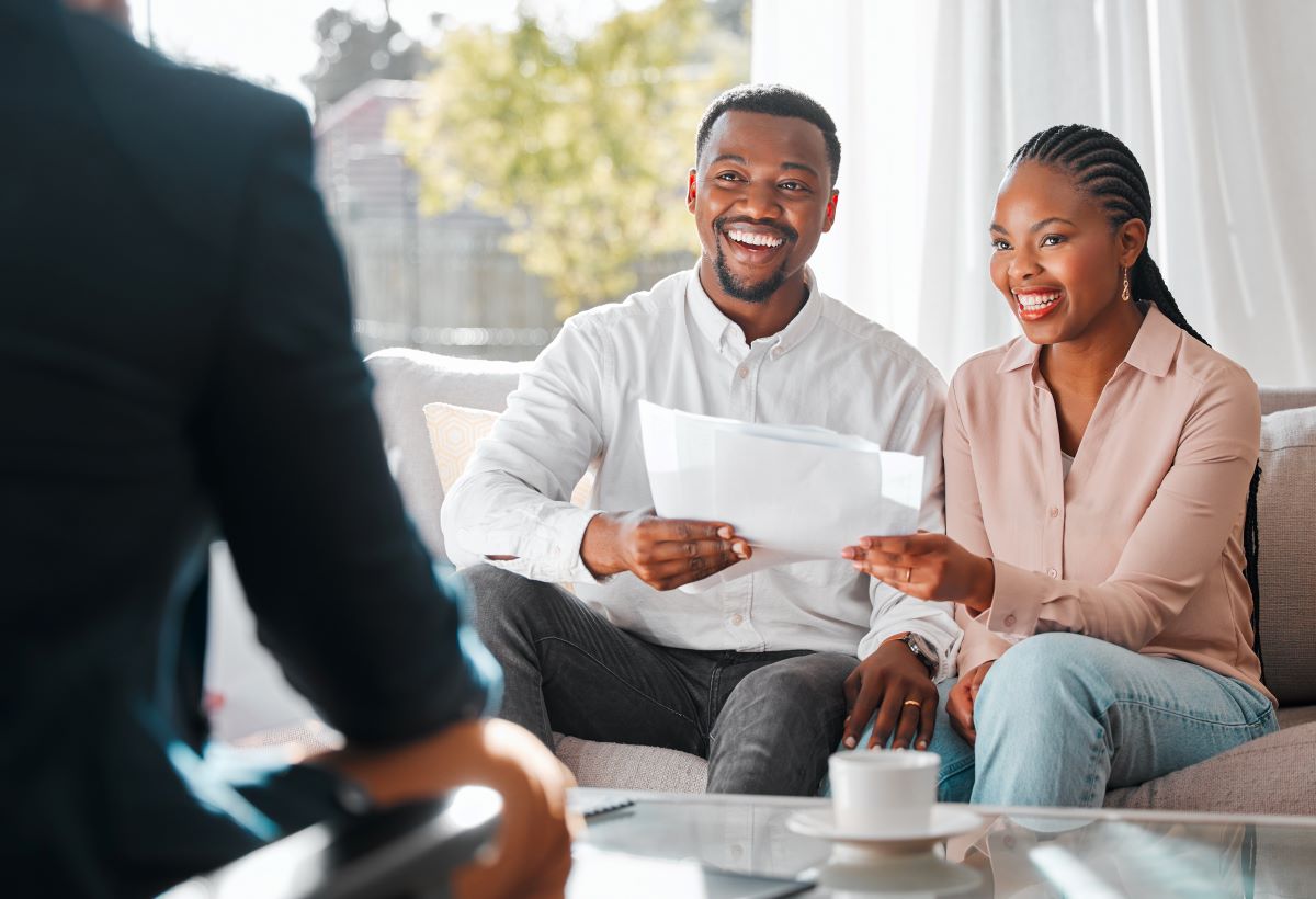 Couple at a meeting with their advisor