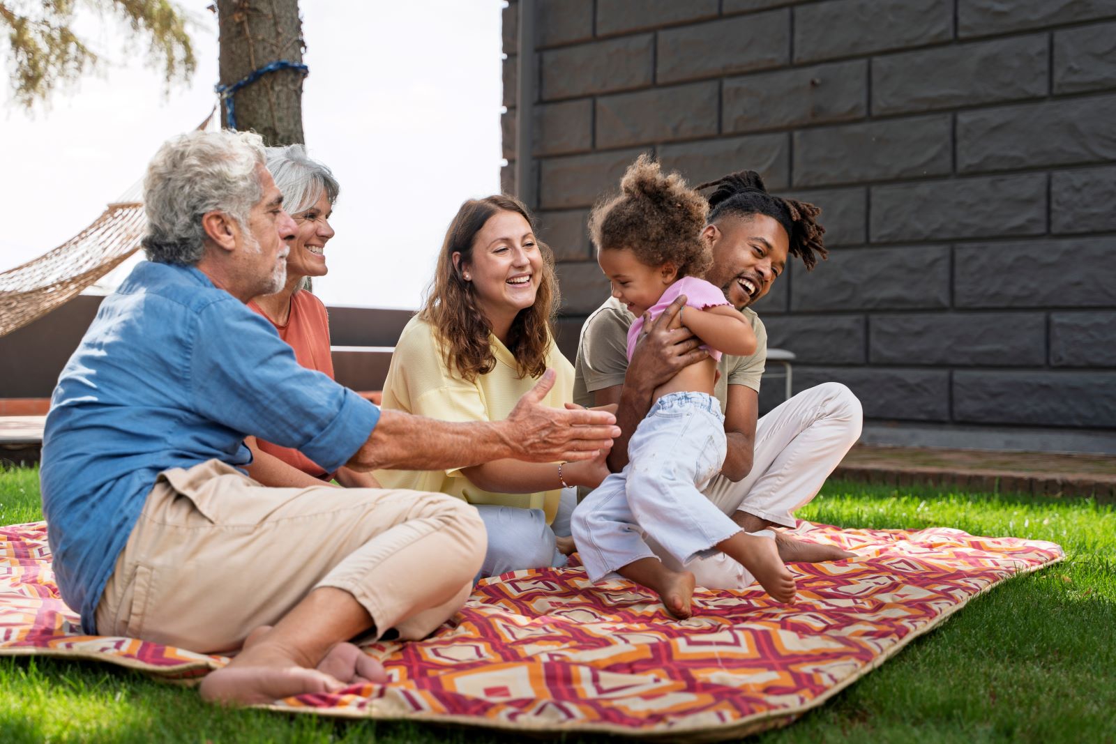 family having fun at their backyard